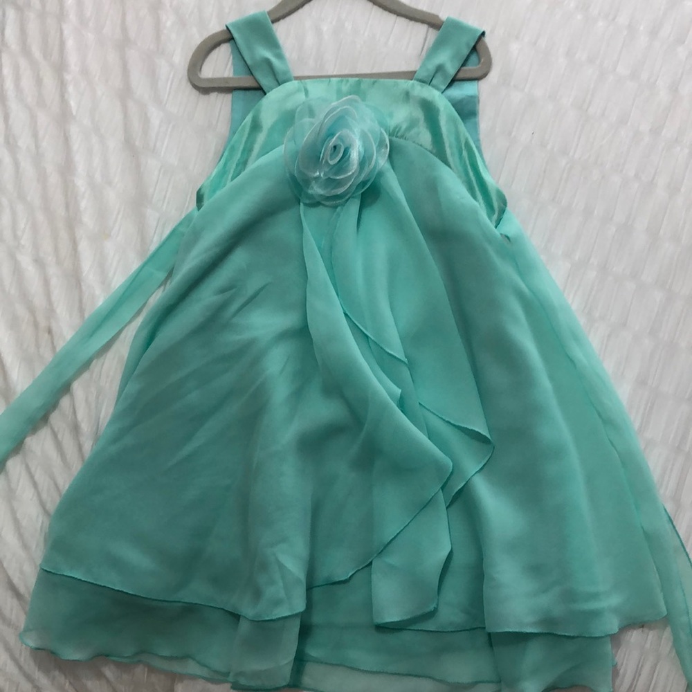 Little girl party dress. Remove able flower pin . MINT green